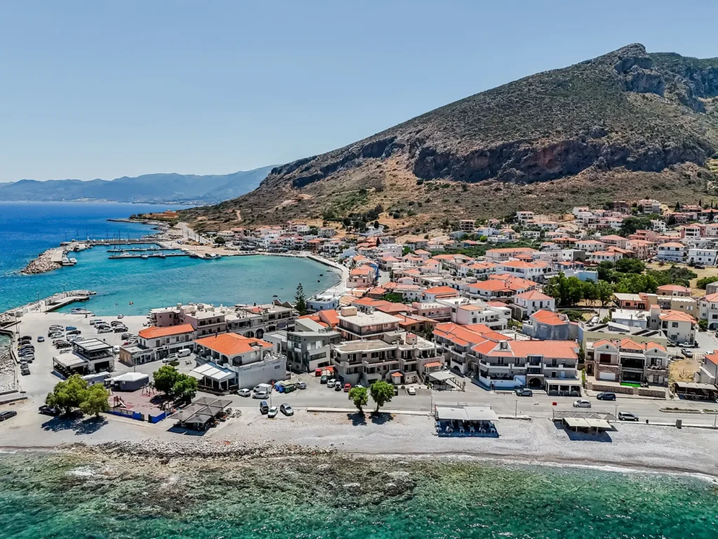 Aerial view of Hotel Filoxenia and the coastal landscape of Monemvasia with the sea and surrounding mountains
